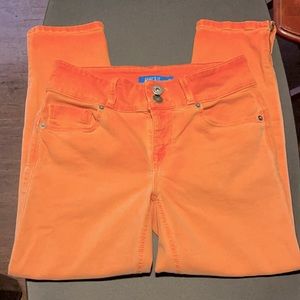 Girls orange stretch jeans. Size girls 9